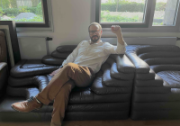 Martin Schwartz on Fassbinder's own couch from his Munich apartment, as seen in Deutschland im Herbst! (Photo credit Isabelle Bastian) 